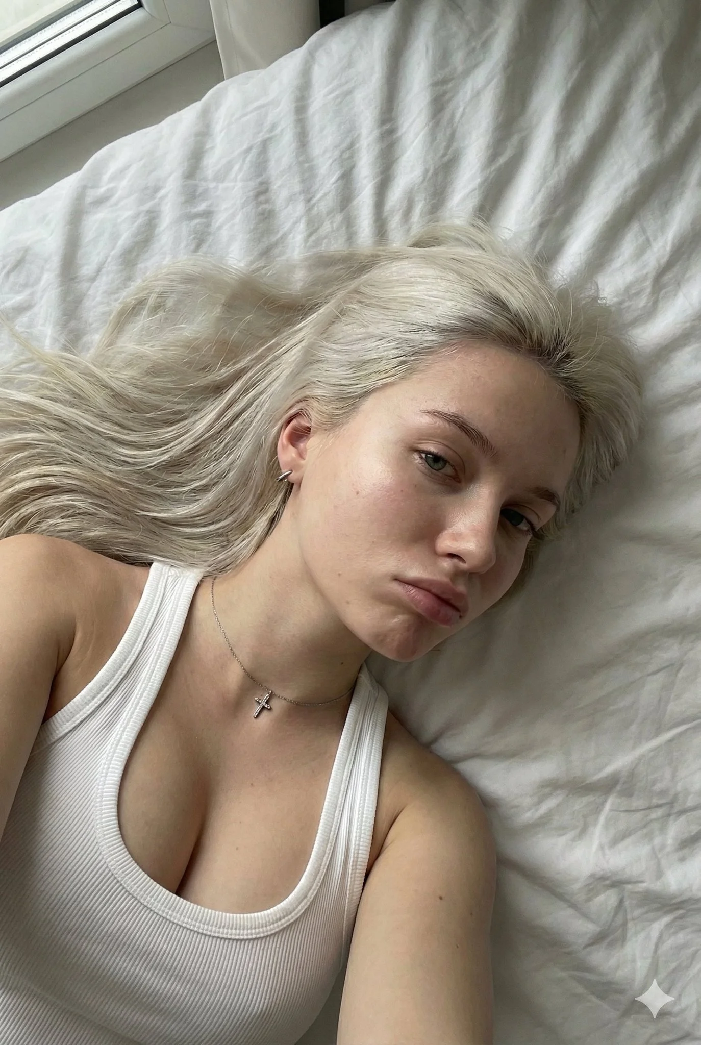 A portrait with light platinum-colored hair.